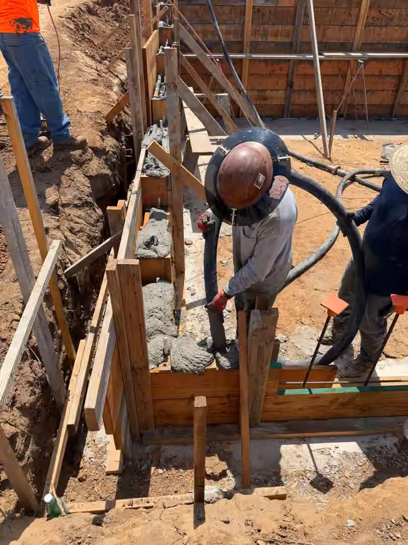Placing concrete in the forms