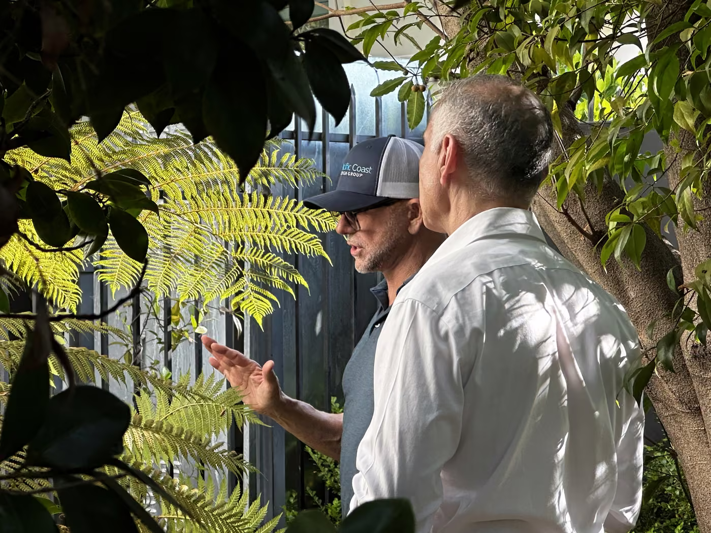 Frank DiMarco walking a project with a homeowner